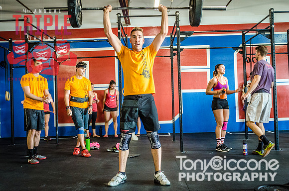 Denver fitness event photography of Open Crossfit Men in Crossfit Cherry Creek's Triple Threat Competition in Denver, Colorado.